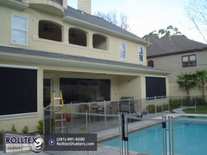 retractable solar screens on first floor home